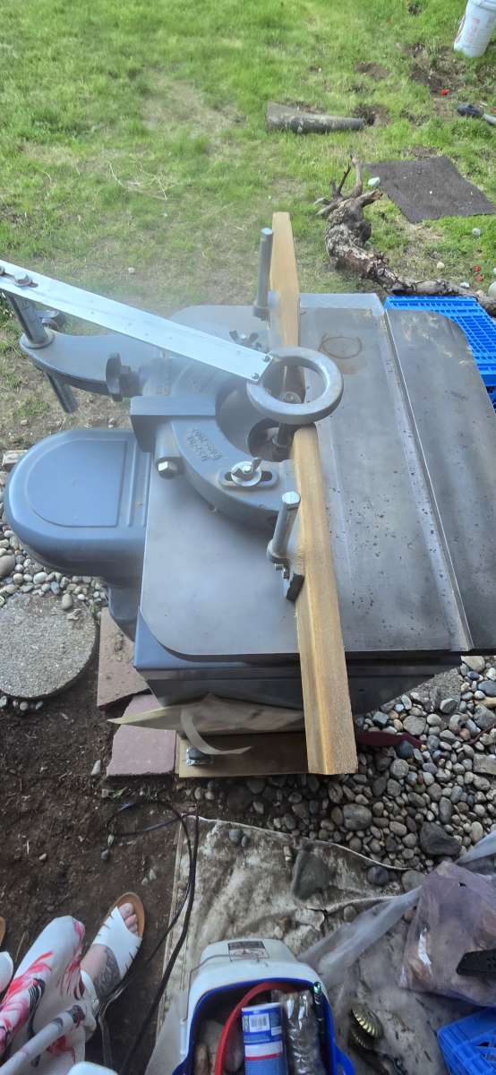 wood shaper with a bunch of bits