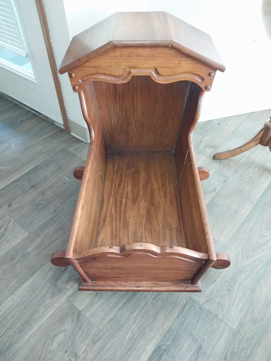Hooded wooden rocking cradle