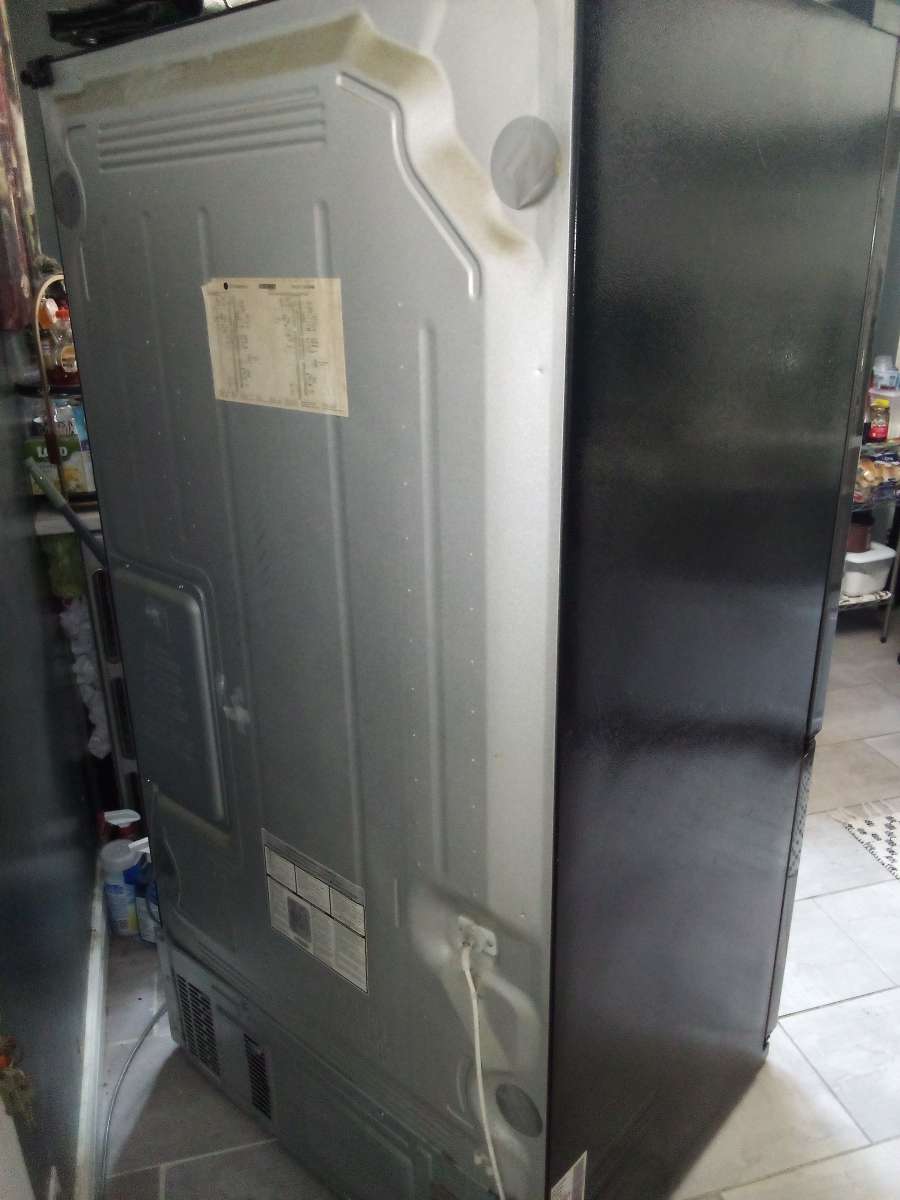 used and half working LG refrigerator