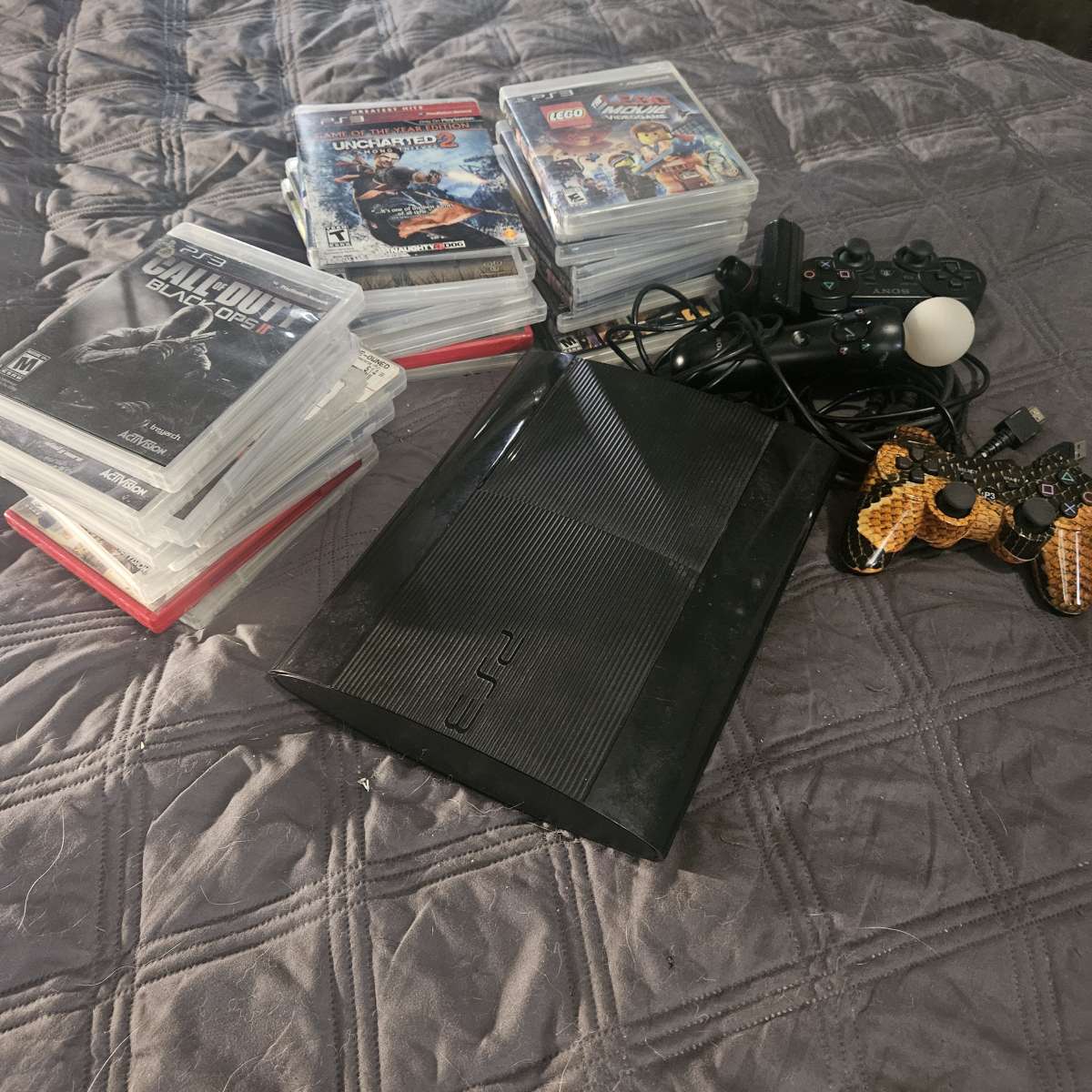 PS3 w 27 games 2 controllers  other accessories