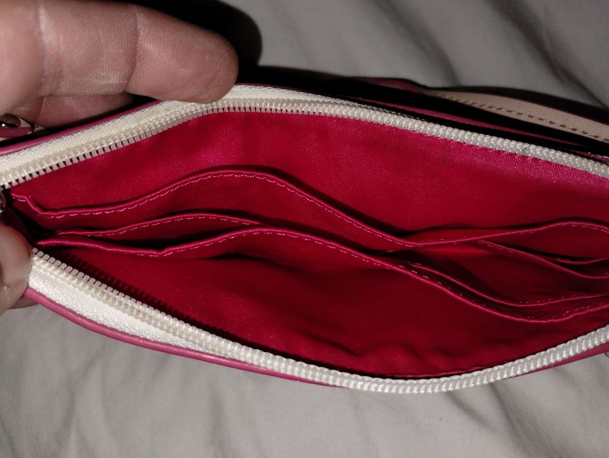 Pink and white COACH Peyton Ombre wristlet