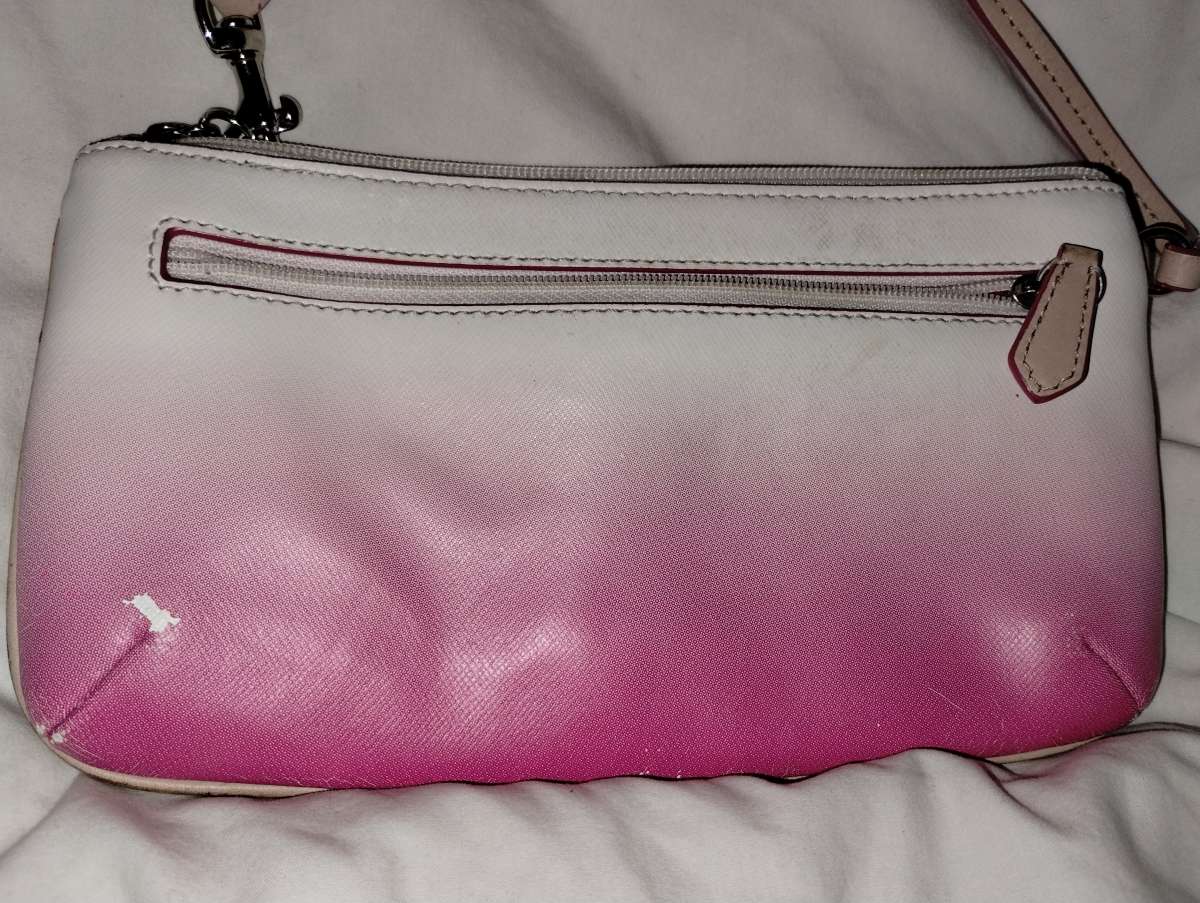 Pink and white COACH Peyton Ombre wristlet