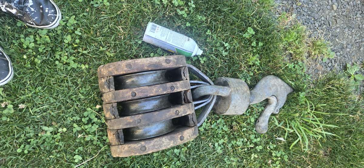 I have a huge wooden 3 wheel Barn pulley