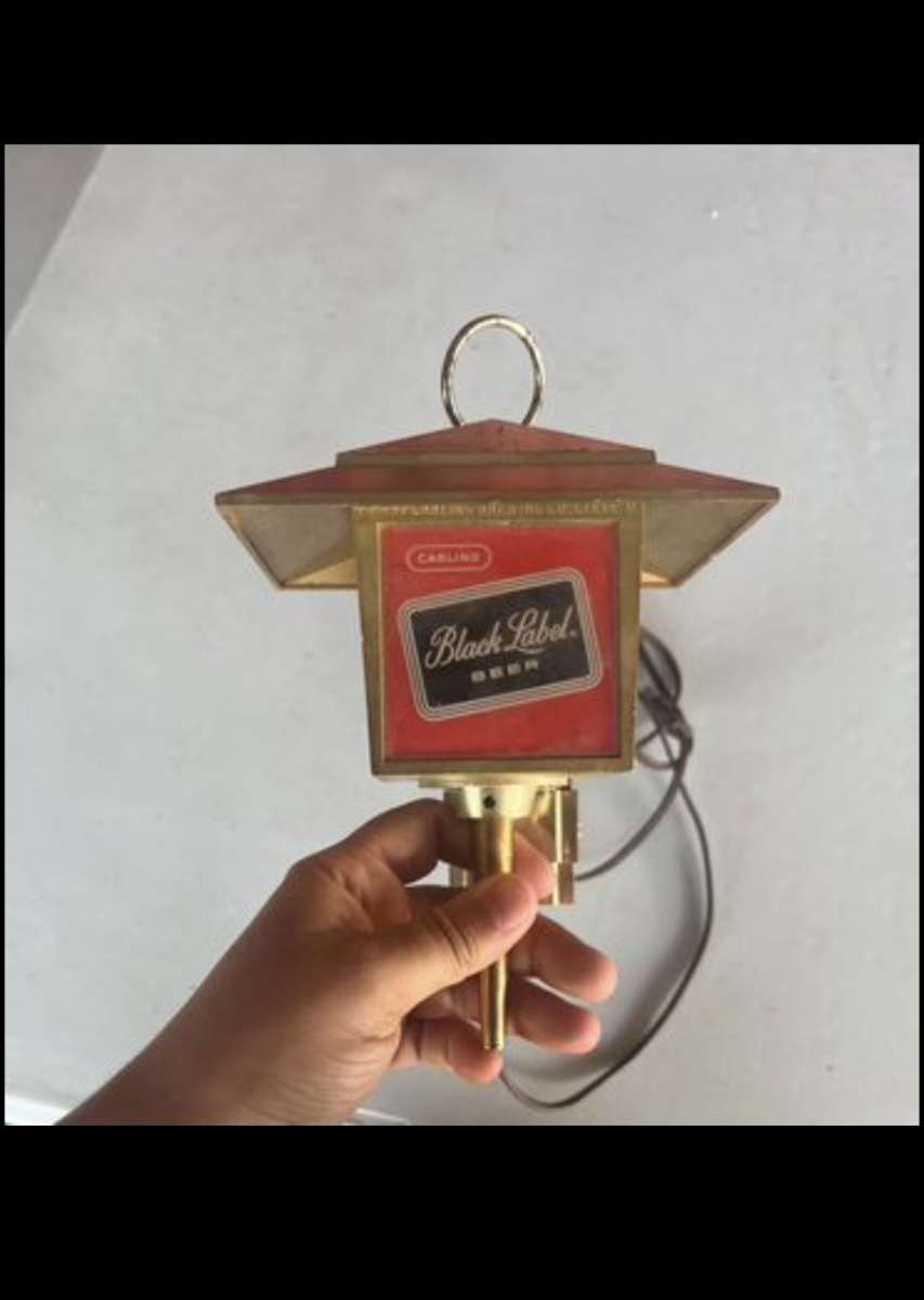 Carling black label beer sconces