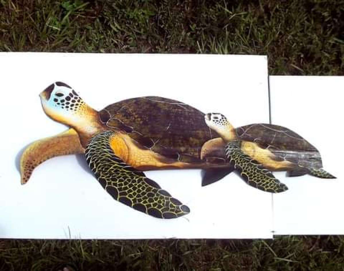 Sea Turtles hand carved from palm tree frond