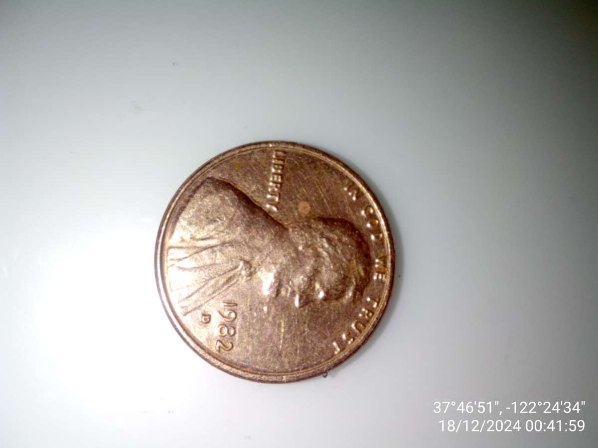 1982 filled D penny with date stamp error
