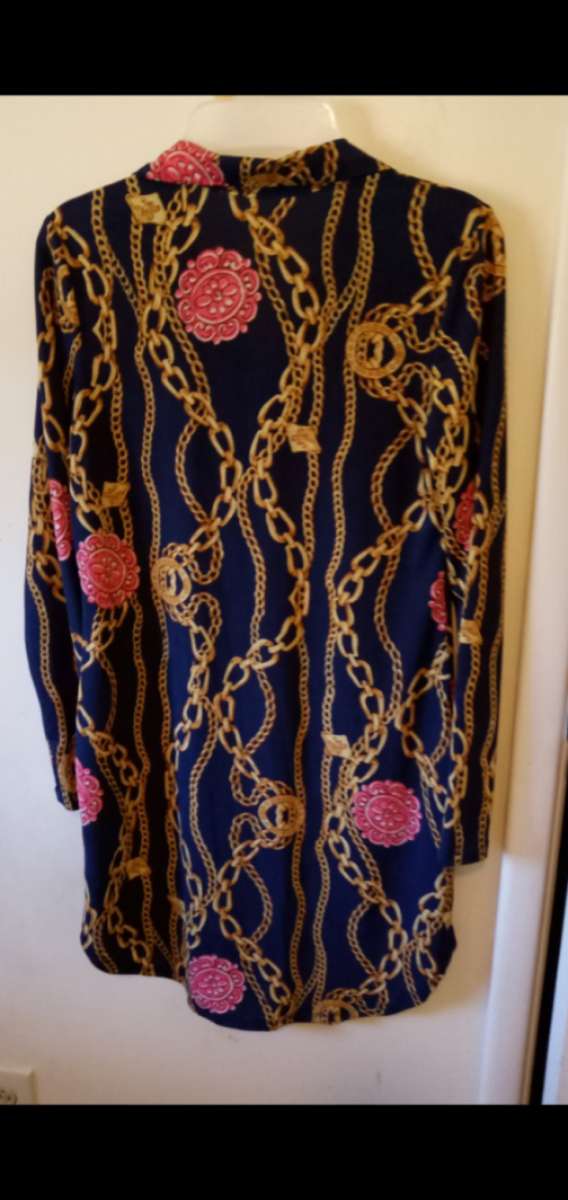 Womens long sleeve blue buttonup Shirt with Chain Design