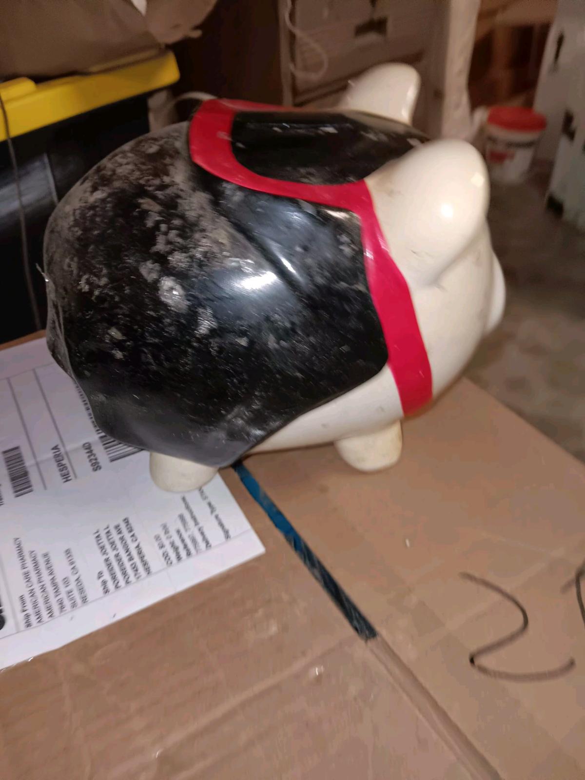black white red piggy bank