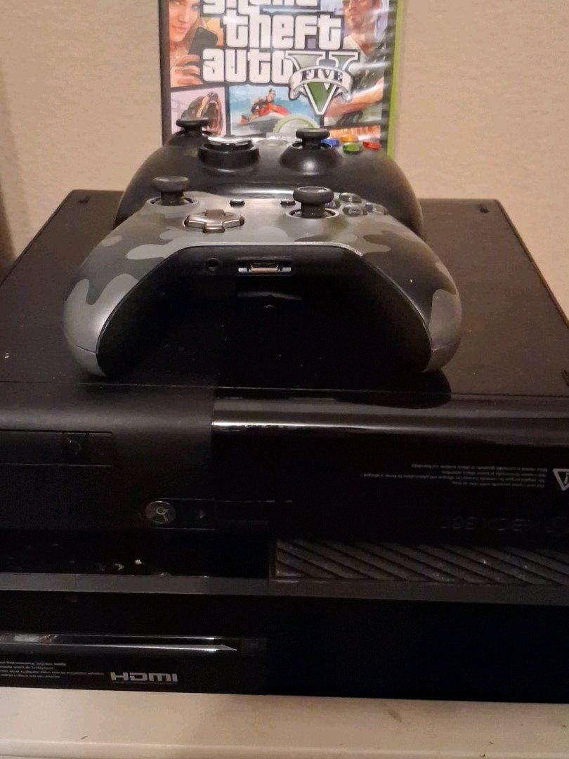 x box with  game  and  controller