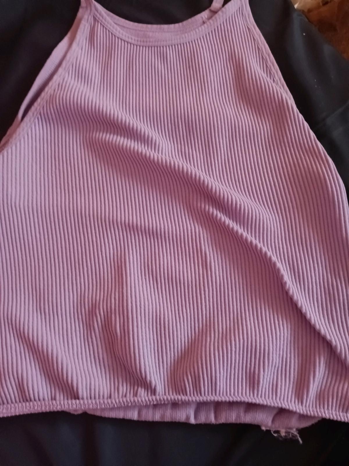 a purple tank top