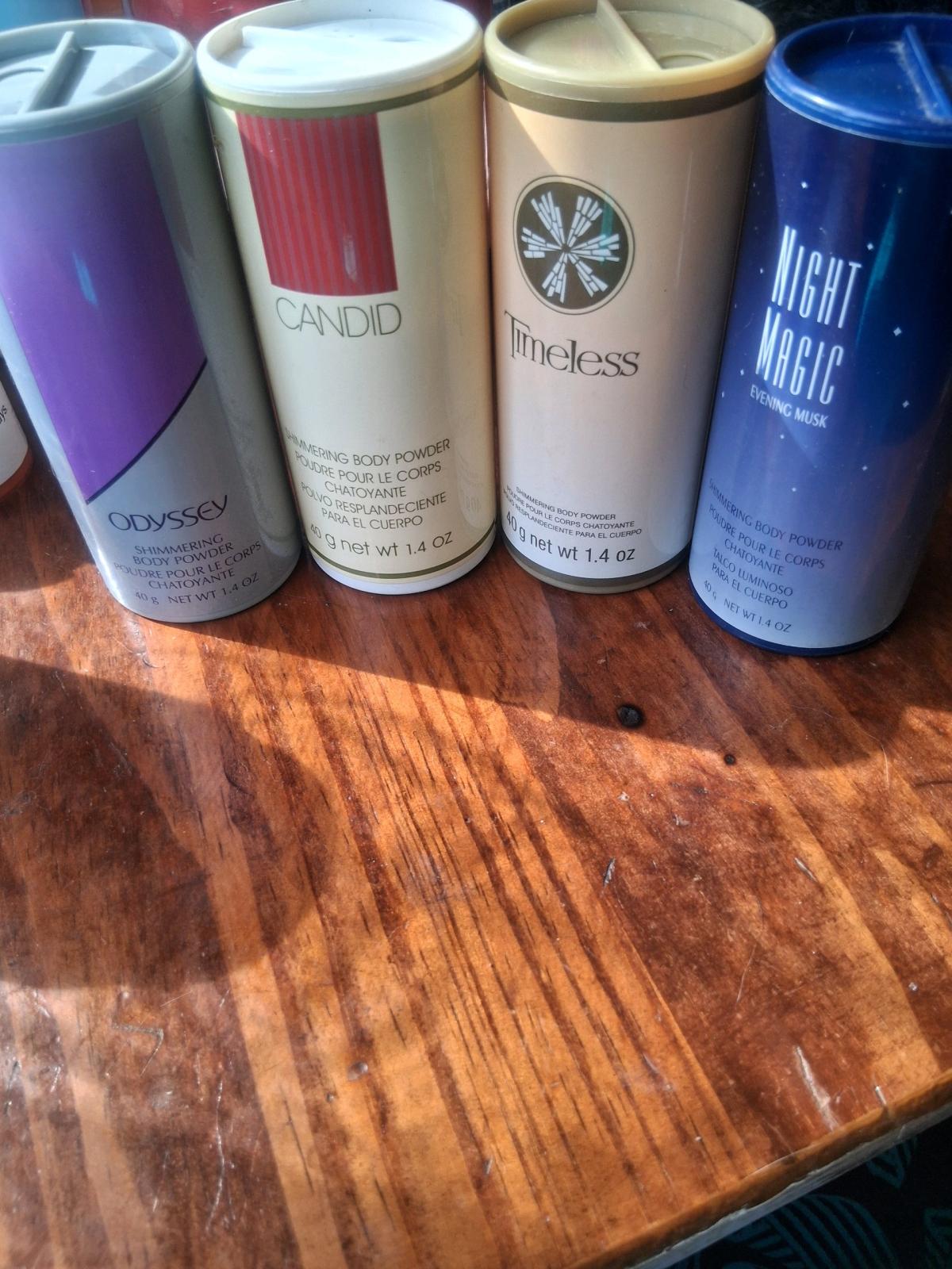 Set of 4Rare Vintage Avon Shimmering Body Powders