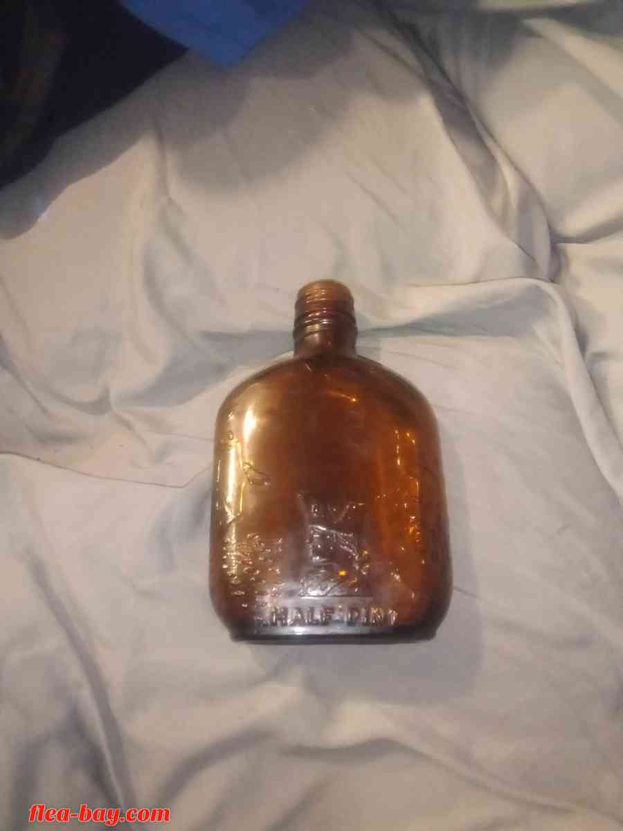 federal law half pint bottle - Logansport, Louisiana - FleaMarketBay