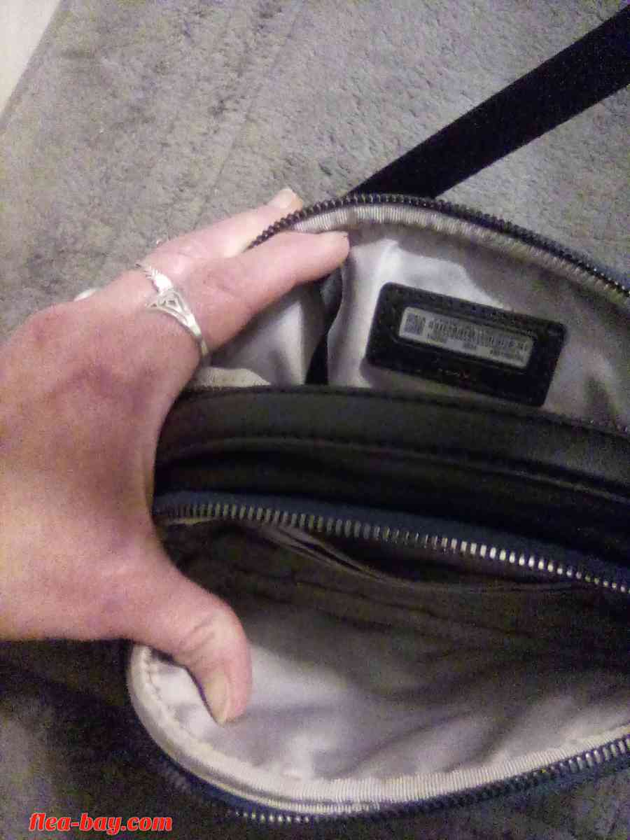 tumi purse - Henderson, Nevada - FleaMarketBay