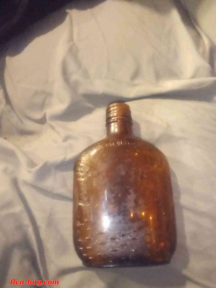 federal law half pint bottle - Logansport, Louisiana - FleaMarketBay
