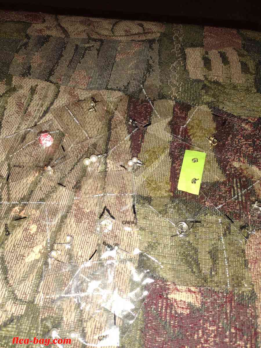 A bundle of post earrings