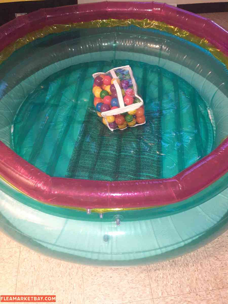blow up ball pit with balls in great condition