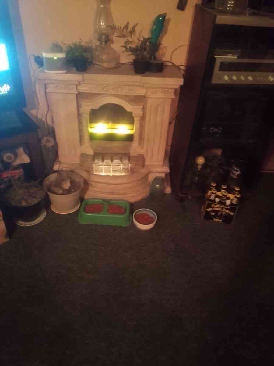 fake fireplace with real waterfall - Joplin, Missouri