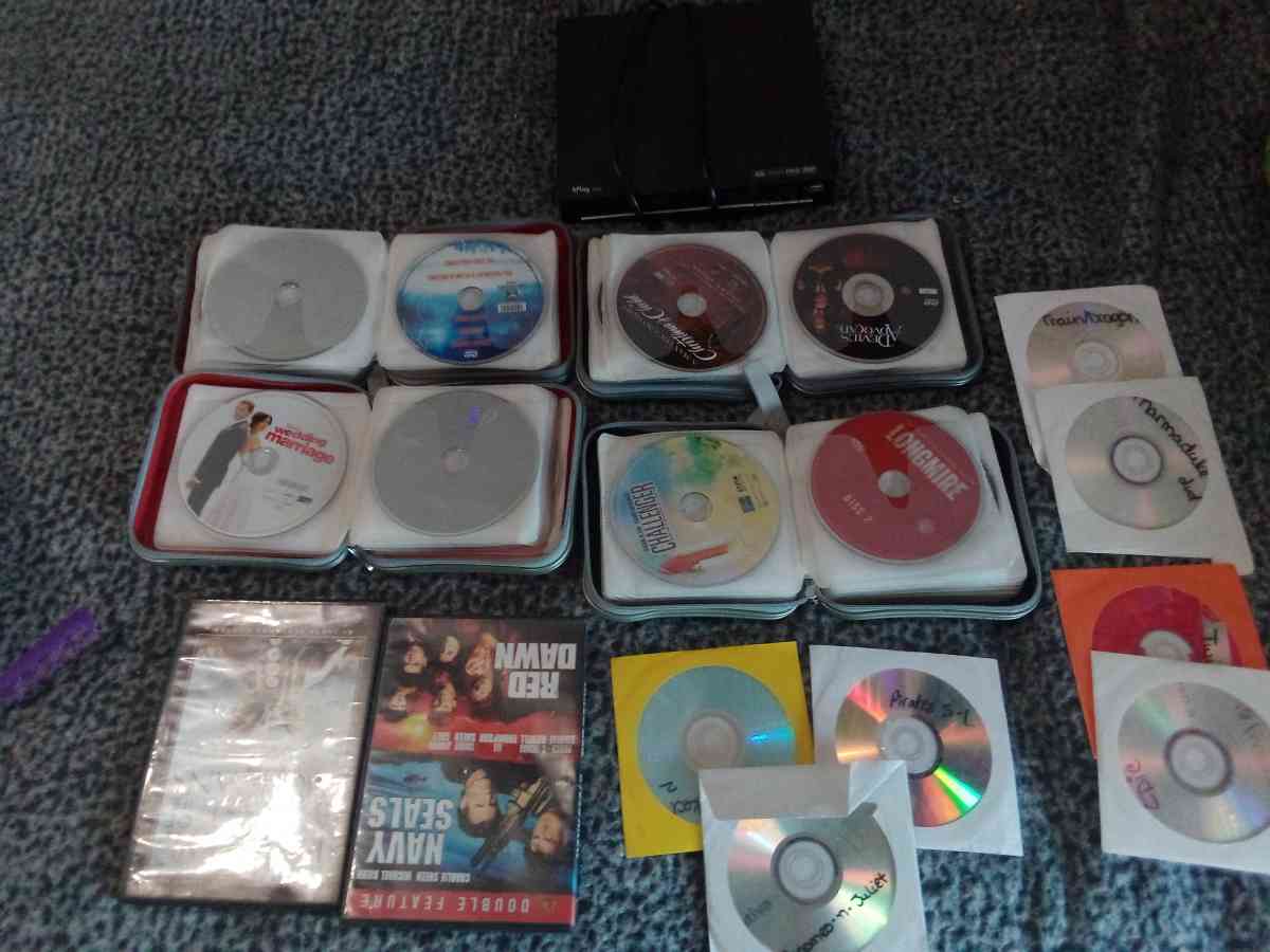 a DVD player w 150 plus movies - Lubbock, Texas