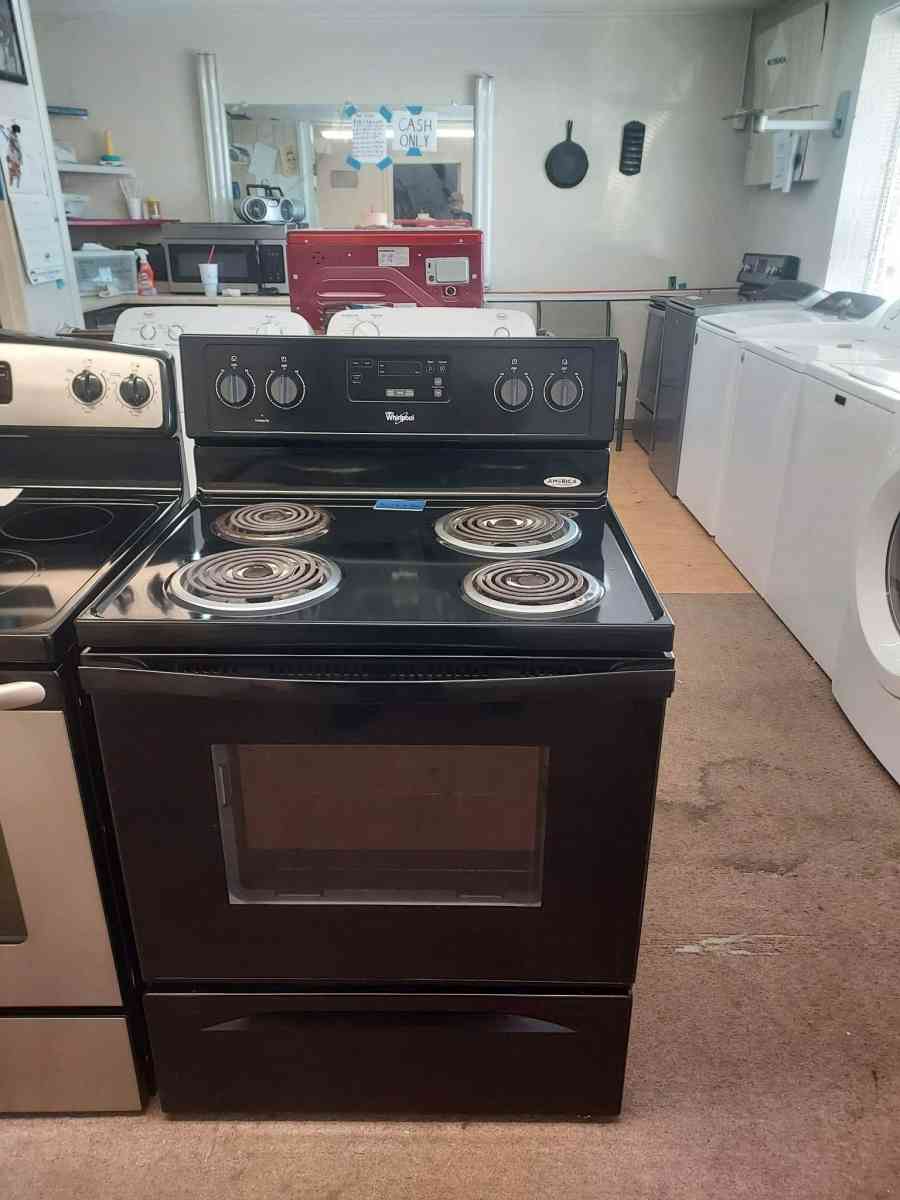 Black whirlpool electric stove - Athens, Alabama