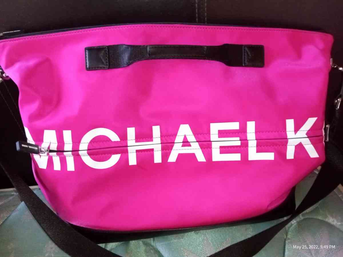 pink Michael kors large duffle bag