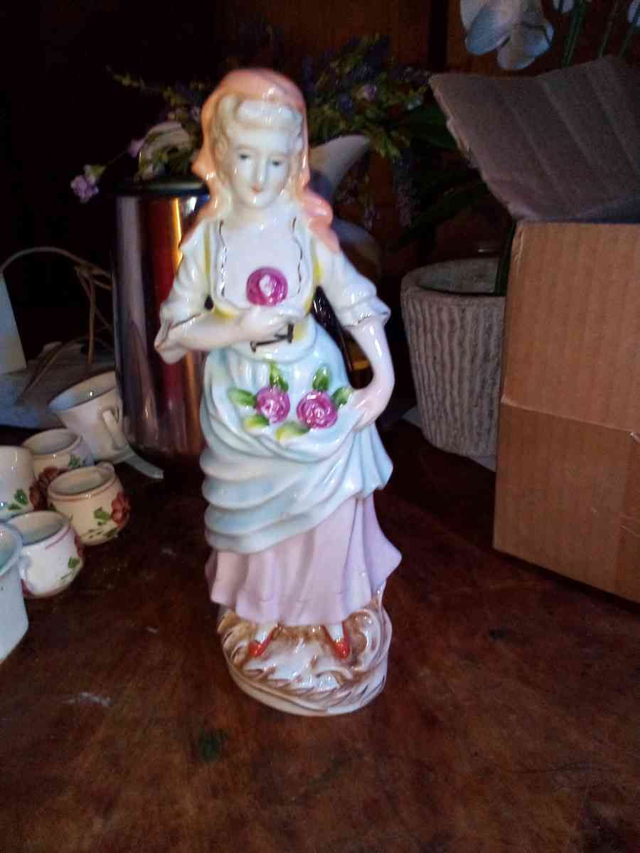 collectible vintage lady holding flower stand - Franklin, Louisiana