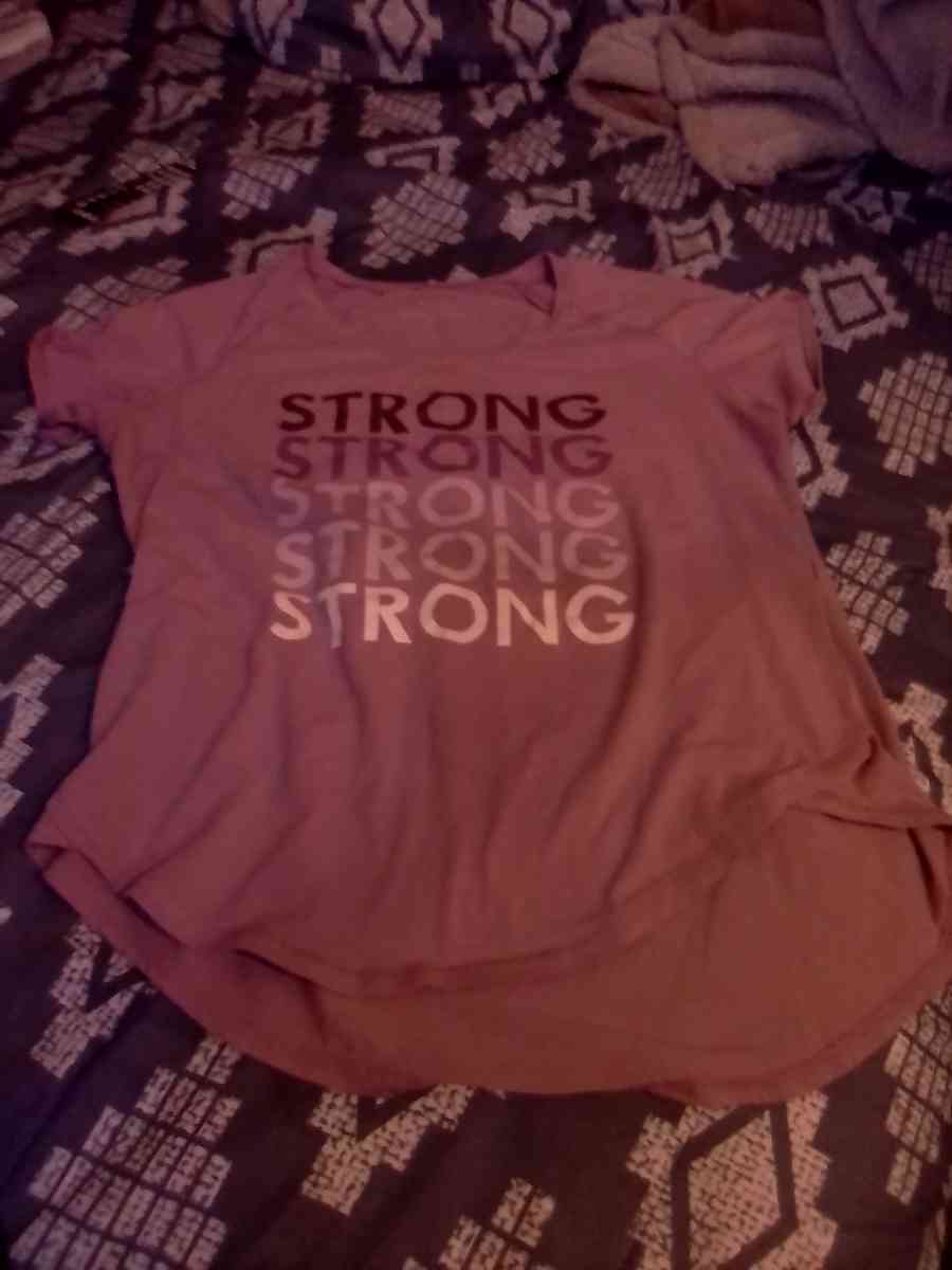 Womans  tee strong size is a M - Banning, California