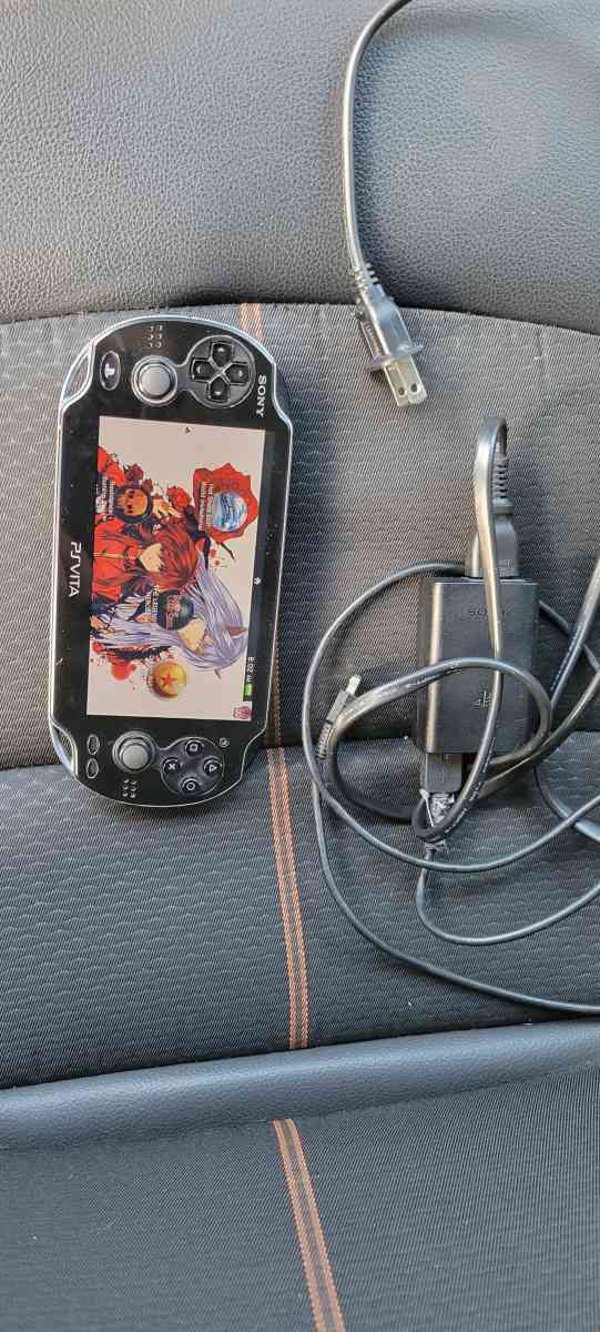 ps vita modded 256 gig memory card and charger with it - Clinton, Oklahoma