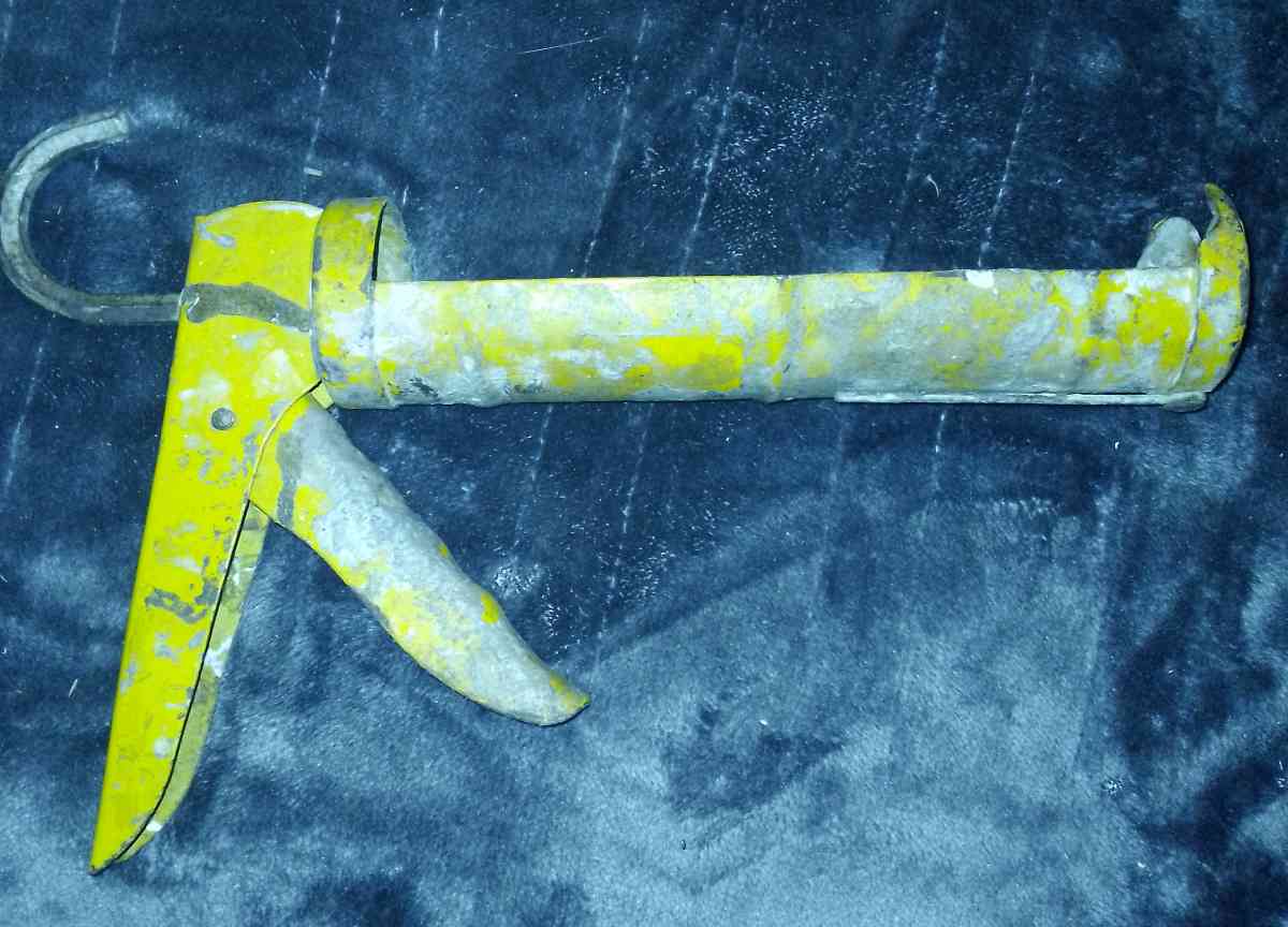 Workers Caulk Gun - Gaston, South Carolina