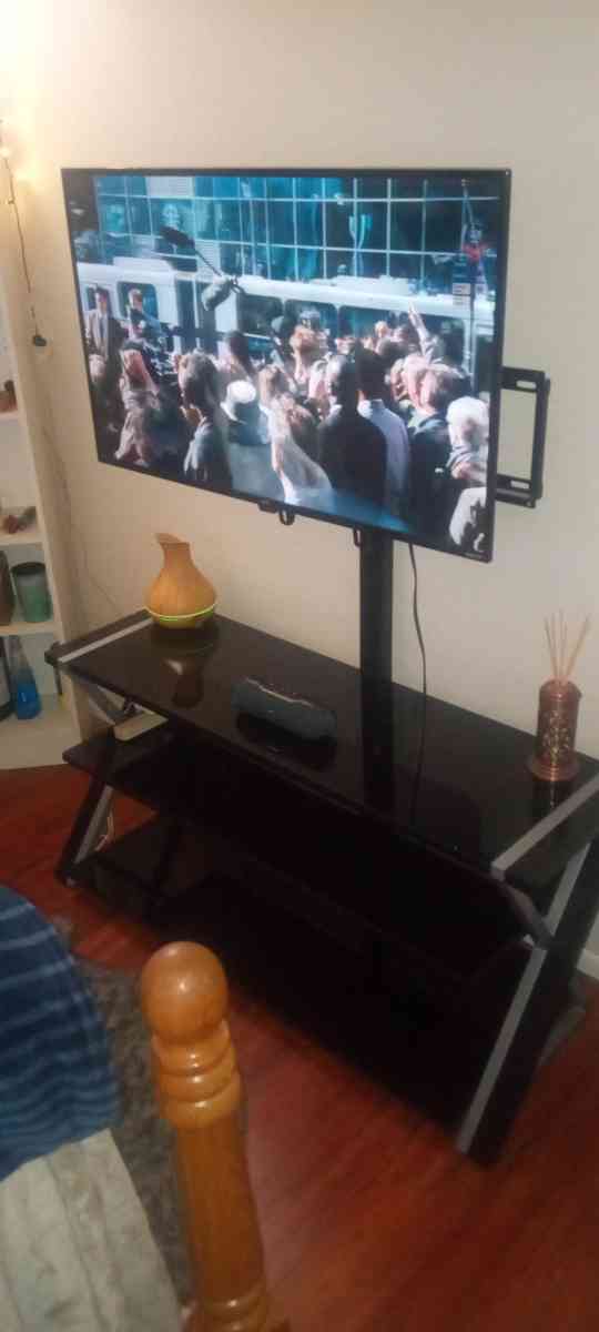 45 inch TV with glass stand with mount built in - Mesa, Arizona
