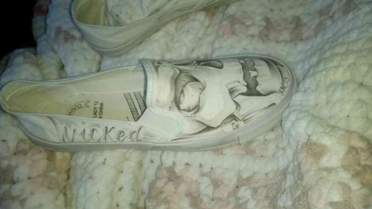 shoes with prison art drawn on them by the homeboy Jhonny m
