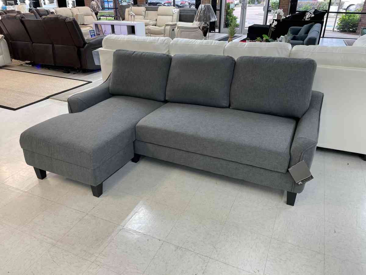 Jarreau aShley Sleeper Sectional in stock  grey on display - Houston, Texas - FleaMarketBay