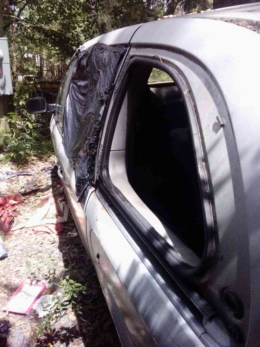 the 2003 Chrysler minivan Voyager for sale needs a little wo - Lake Butler, Florida - FleaMarketBay