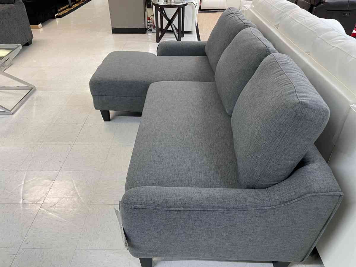 Jarreau aShley Sleeper Sectional in stock  grey on display - Houston, Texas - FleaMarketBay