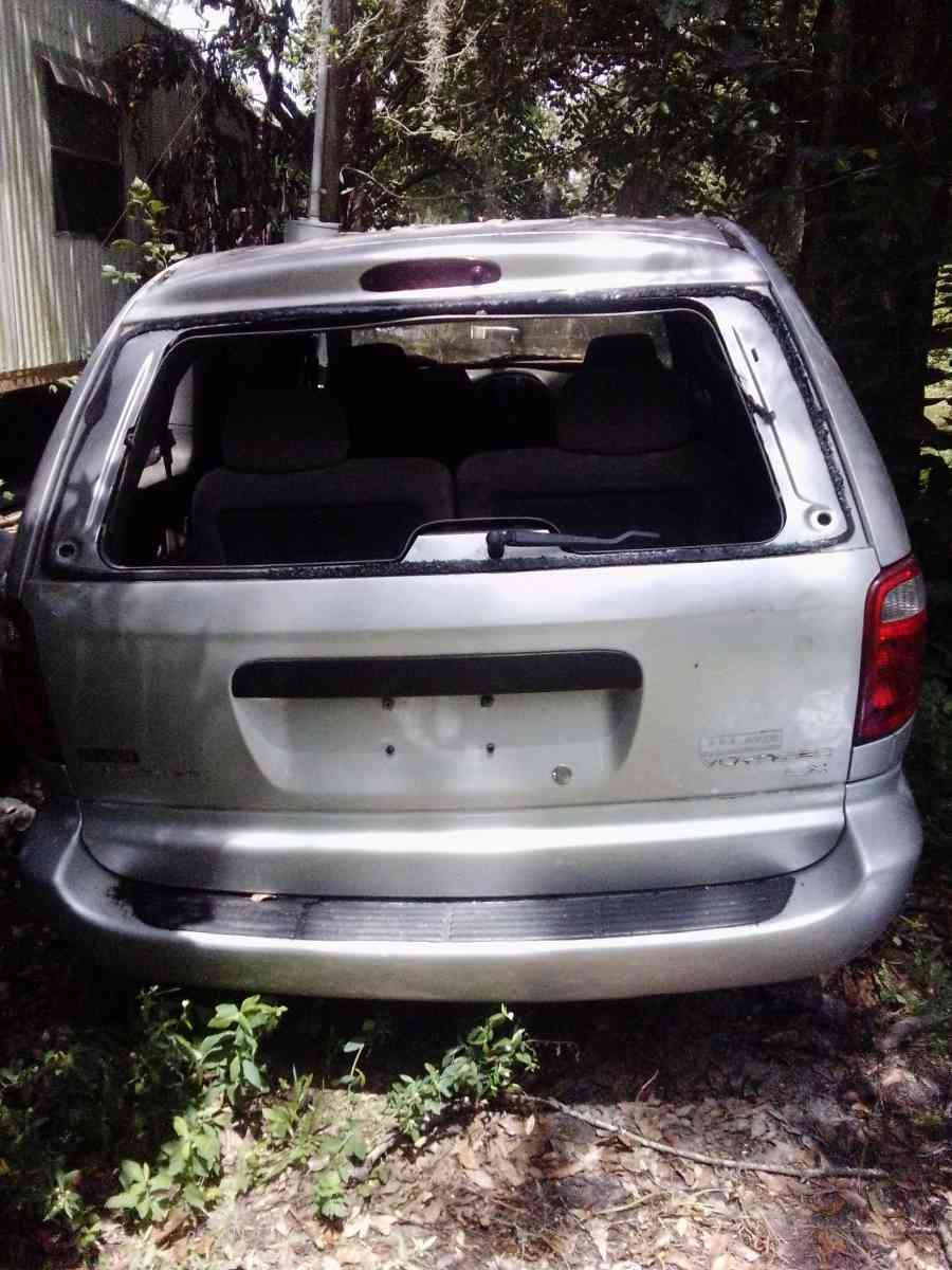 the 2003 Chrysler minivan Voyager for sale needs a little wo - Lake Butler, Florida