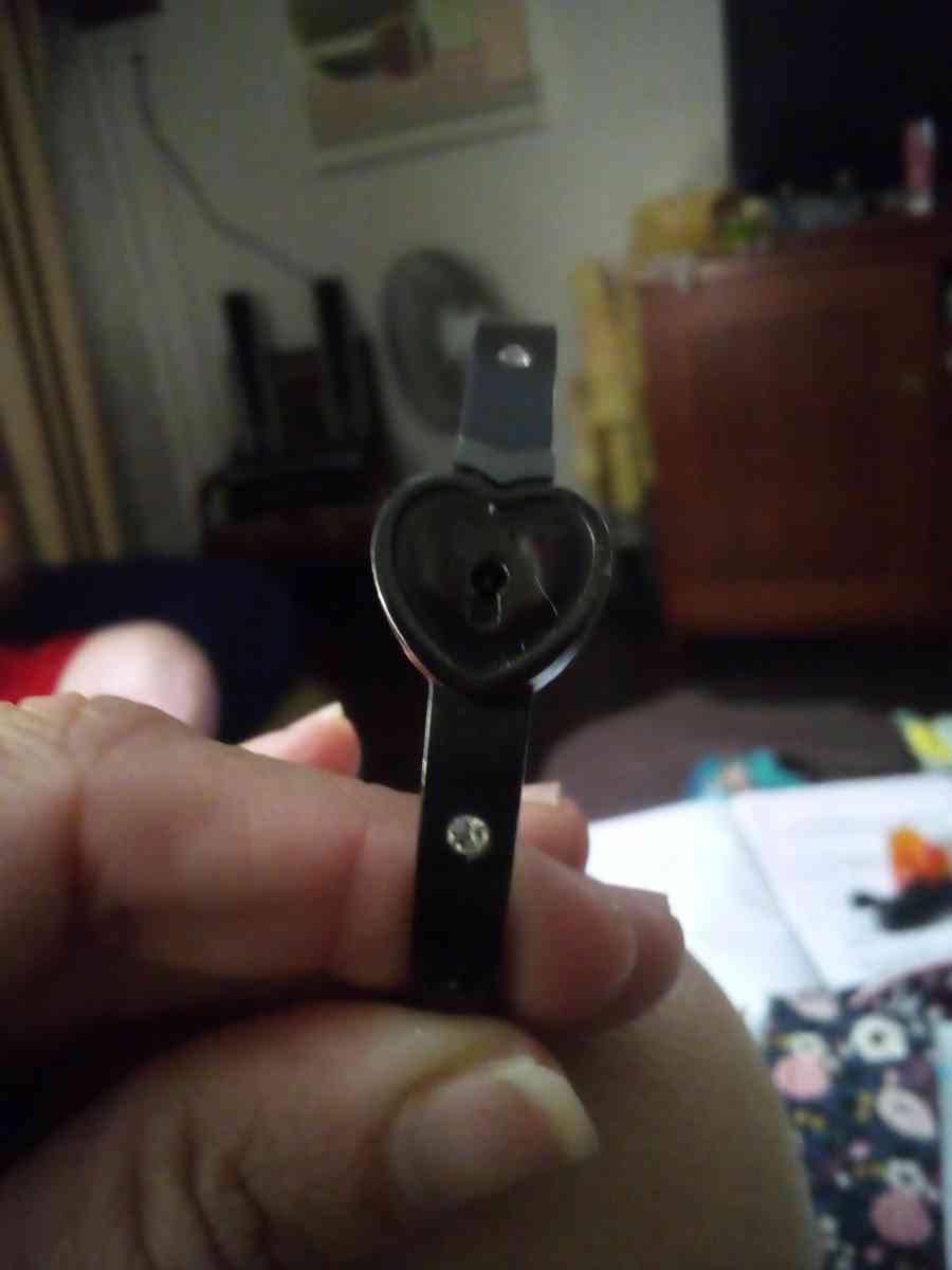 a black bracelet and a white Kate Spade bracelet - Phoenix, Arizona