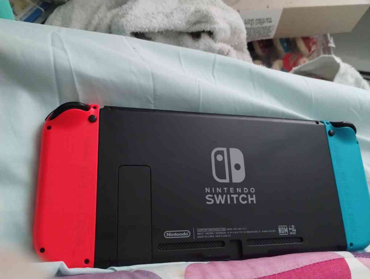 Nintendo switch neon red and blue and accessories - Grand Rapids, Michigan