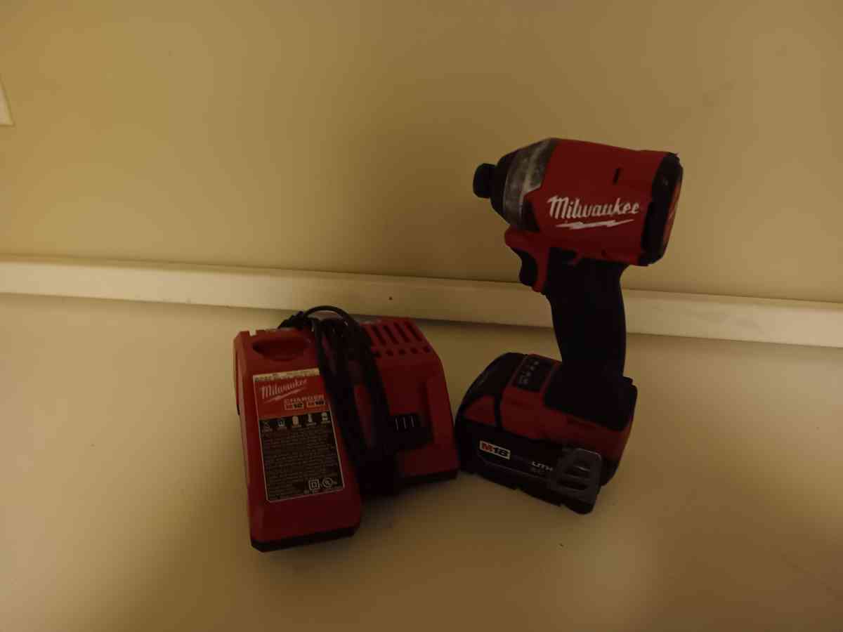 Milwaukee impact drill with battery and charger - Seattle, Washington