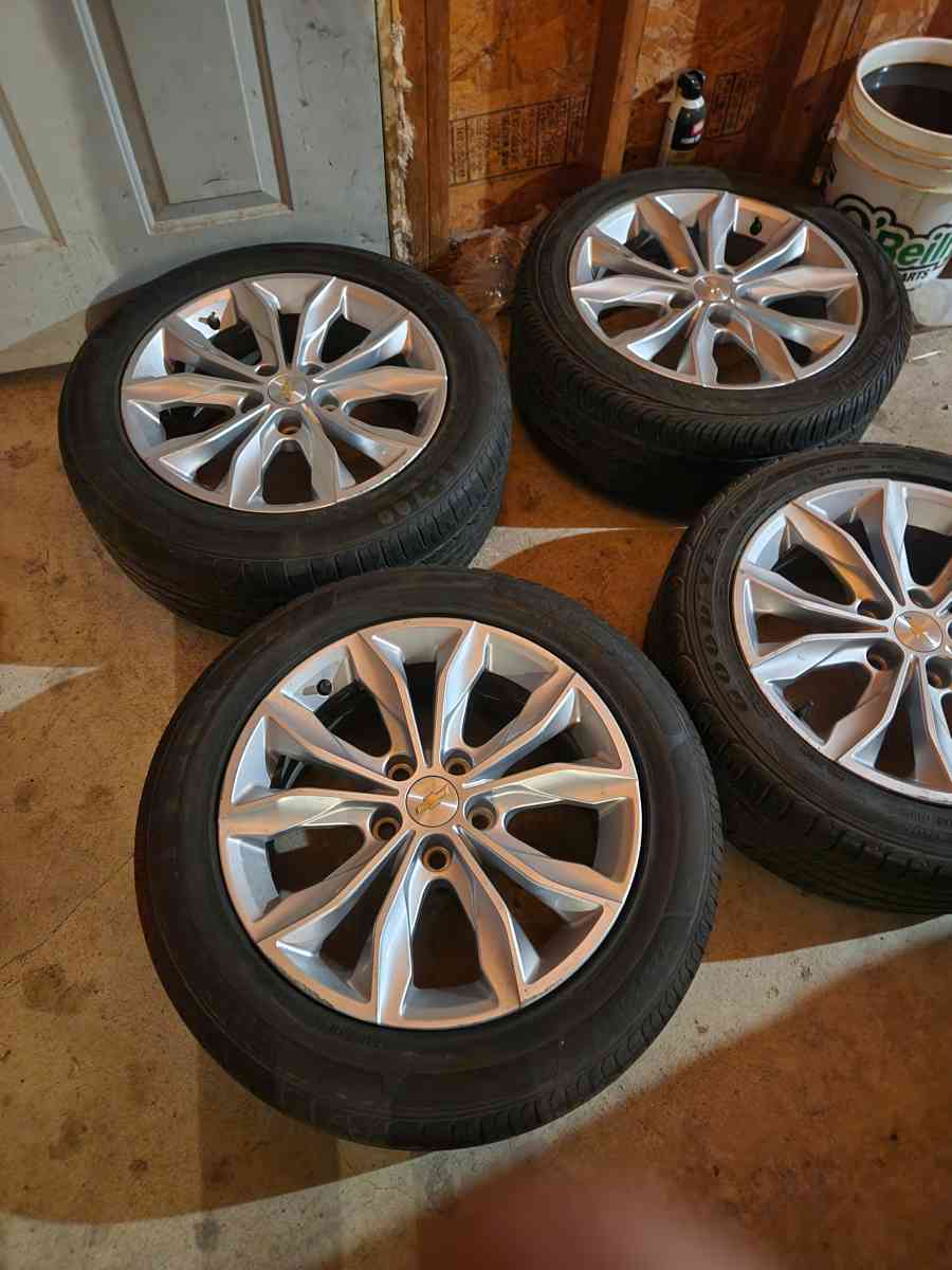 A set of 4 17 inch rims and tires - Rochelle, Illinois - FleaMarketBay