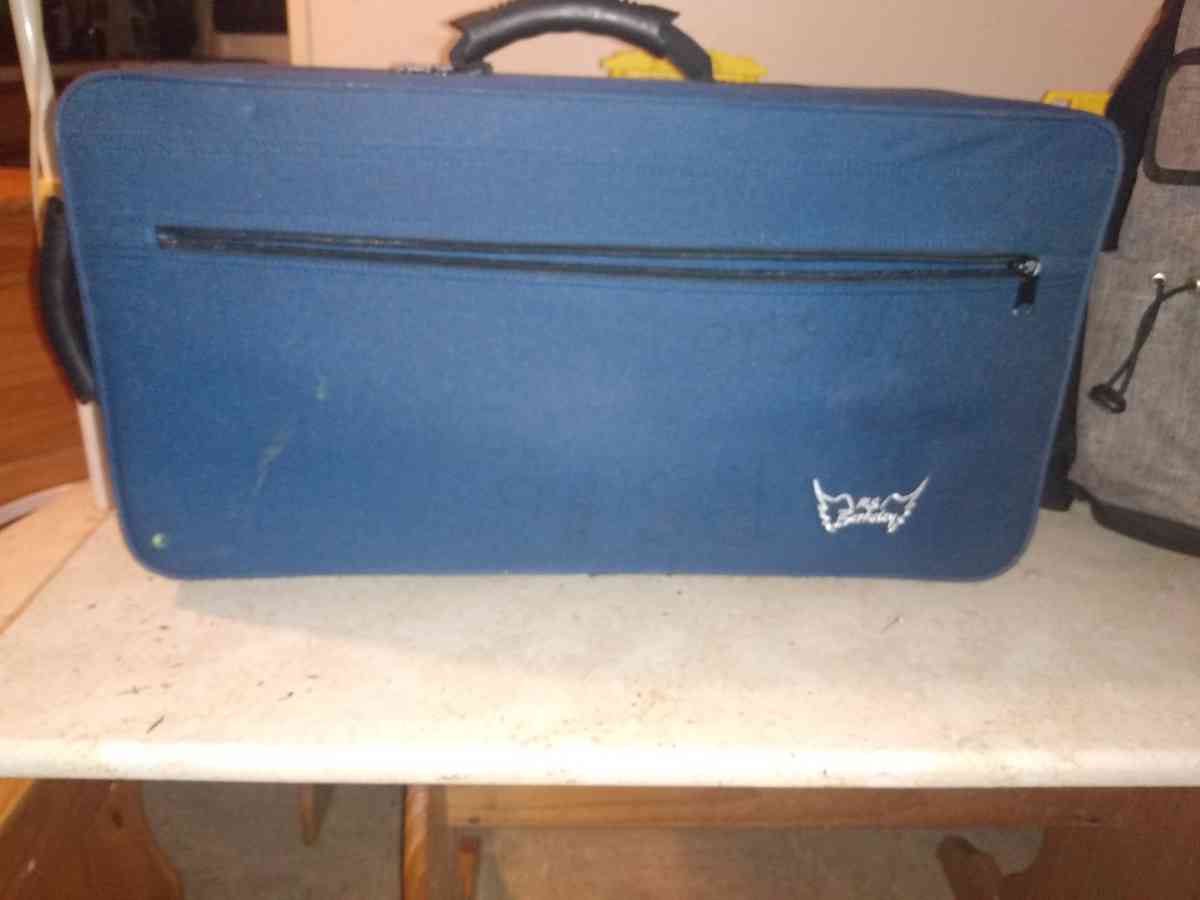 instrument case with book and straps - Hazleton, Pennsylvania