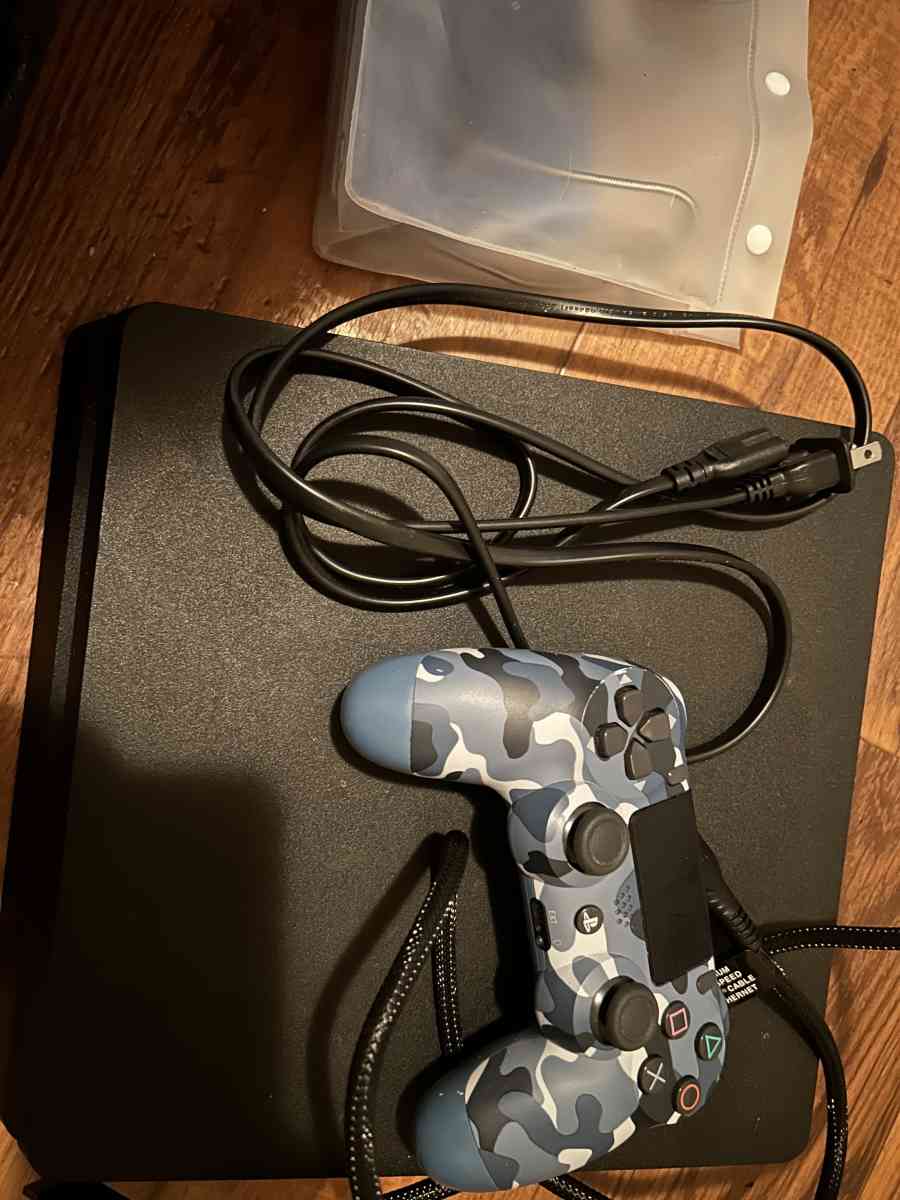 ps4 w game and a blue controller trades or cash pls lmk text - Smyrna, Georgia - FleaMarketBay