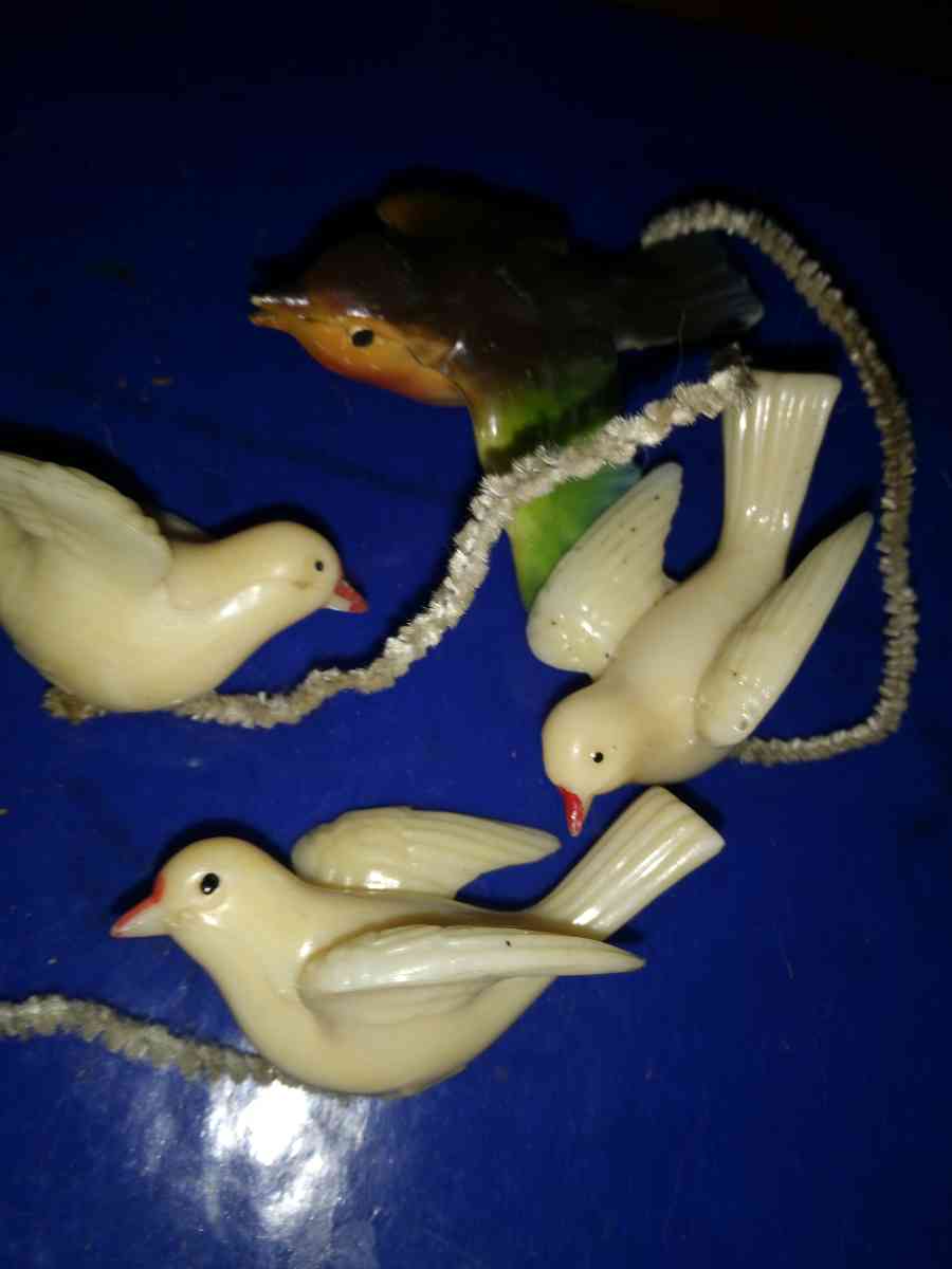 3 white and 1 airbrushed Lucite Birds - Pawtucket, Rhode Island