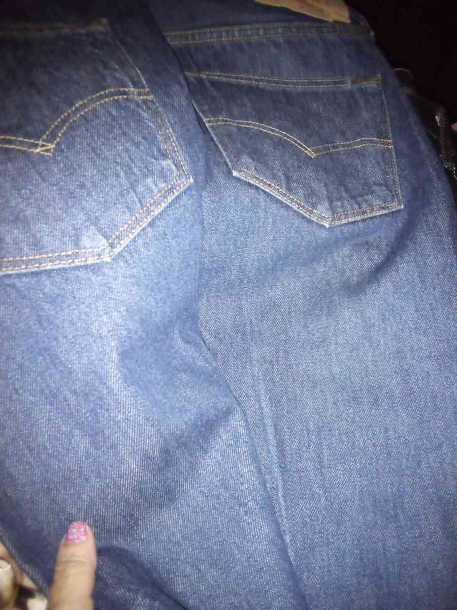 men blue jeans  he has different designs sizes are mostly 38 - Phoenix, Arizona