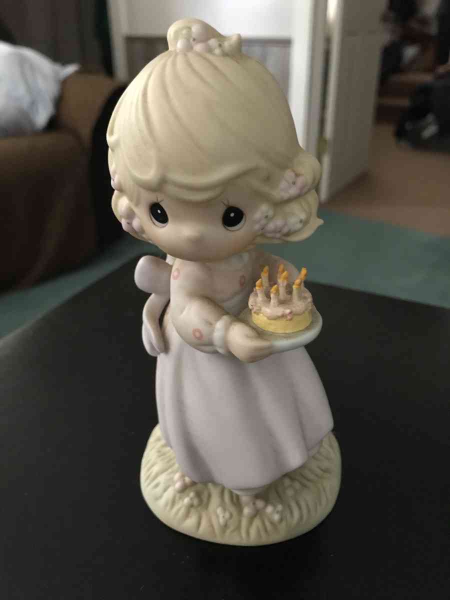 precious moment girl holding a cake - Toledo, Ohio