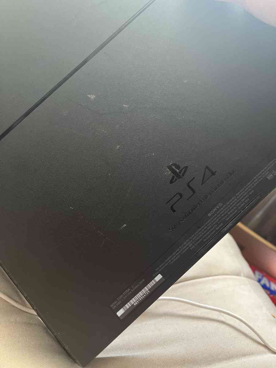 Black Playstation 4 - Jenison, Michigan