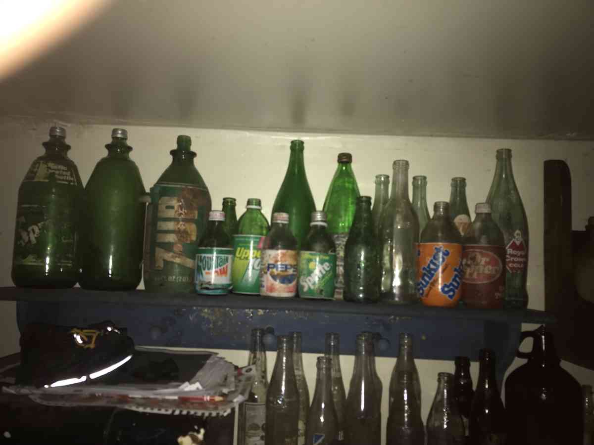 old soda bottles and beer bottles and others - Morgantown, West Virginia