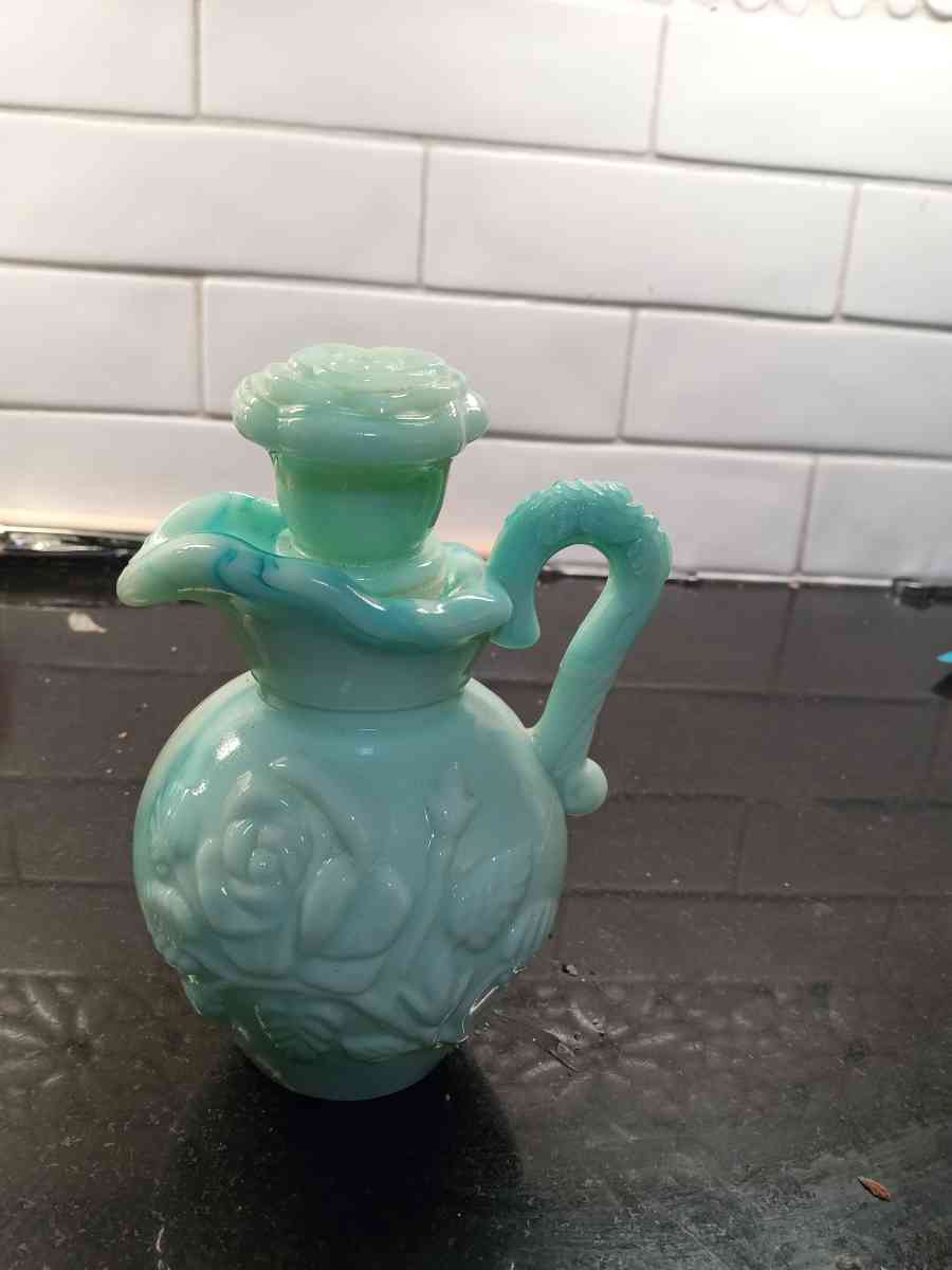 green blue swirl collective bottle