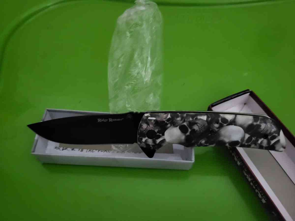 skeleton head spring assist knife