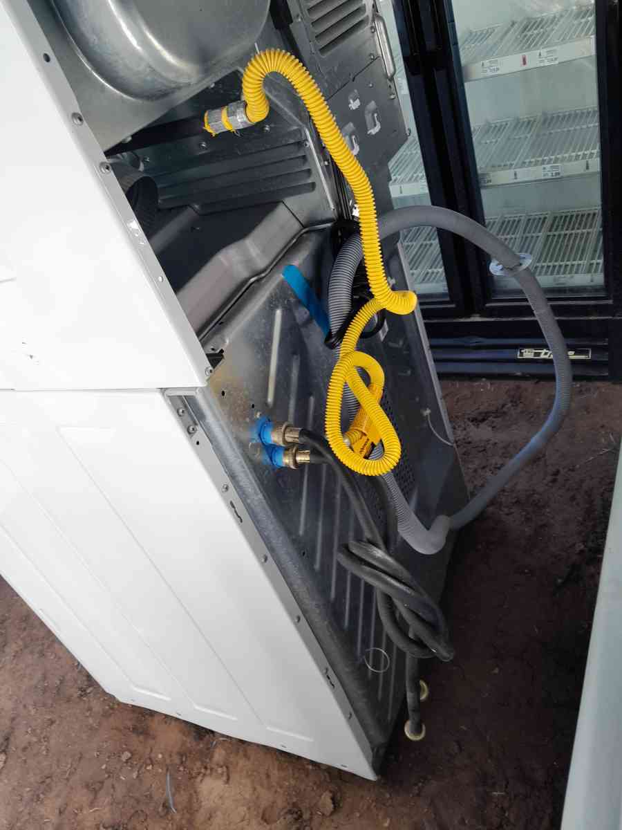 STACK UNIT WASHER DRYER ELECTRIC GAS MODEL FRIGIDAIRE 2022 - Alpine, Arizona - FleaMarketBay