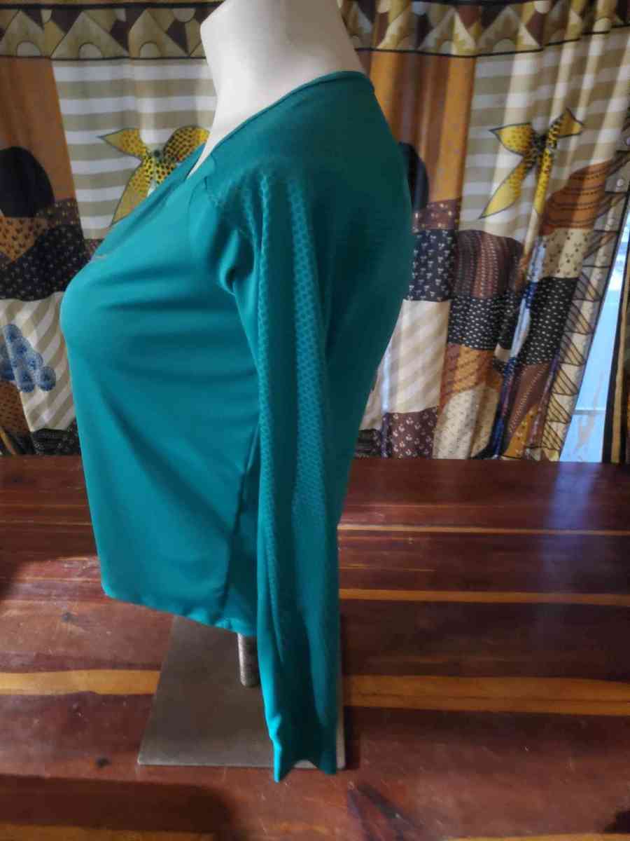 Nike size medium dry fit turquoise shirt bust 36 inches - Altoona, Alabama - FleaMarketBay