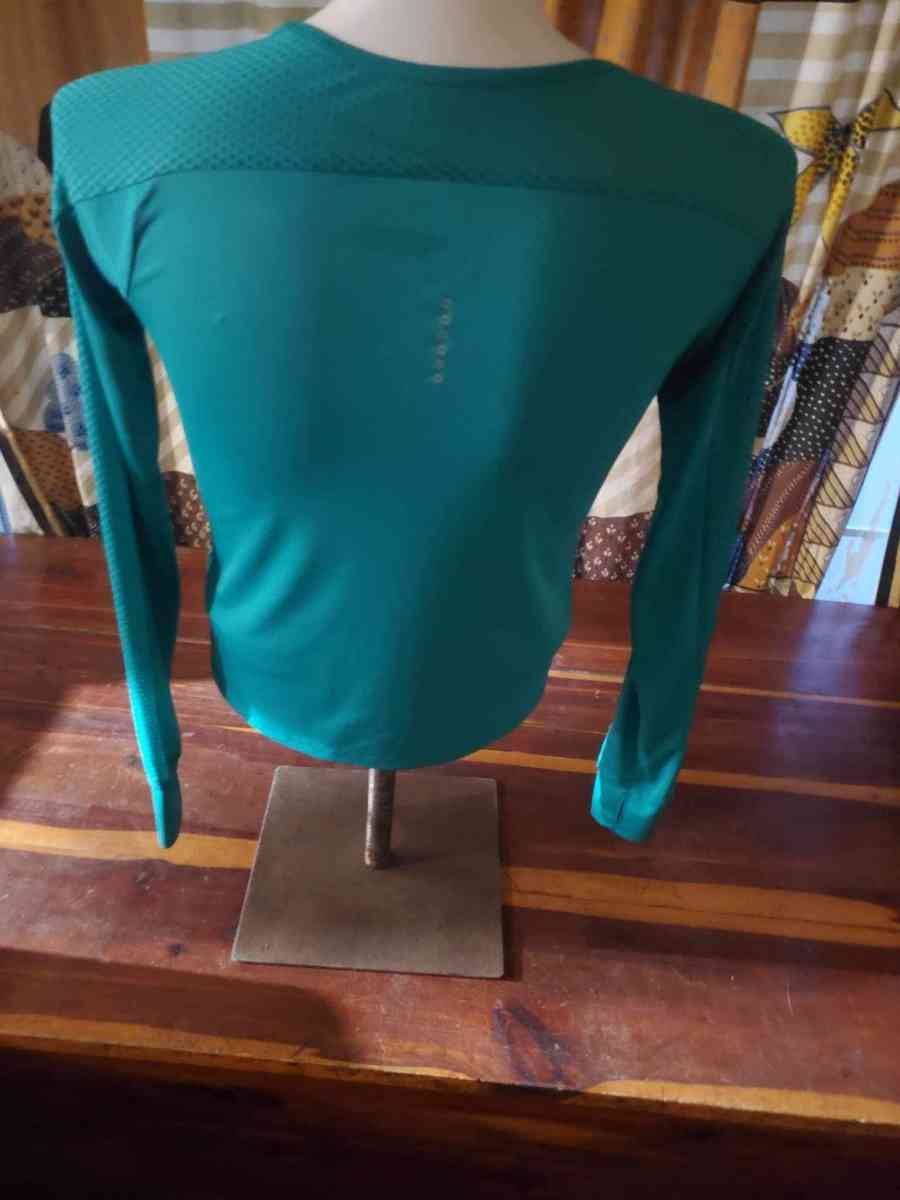 Nike size medium dry fit turquoise shirt bust 36 inches - Altoona, Alabama - FleaMarketBay